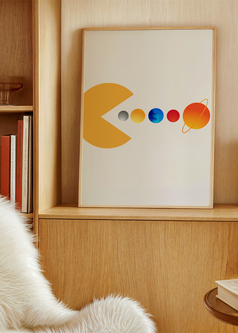 Prostorová ilustrace Pac‑Man a planety