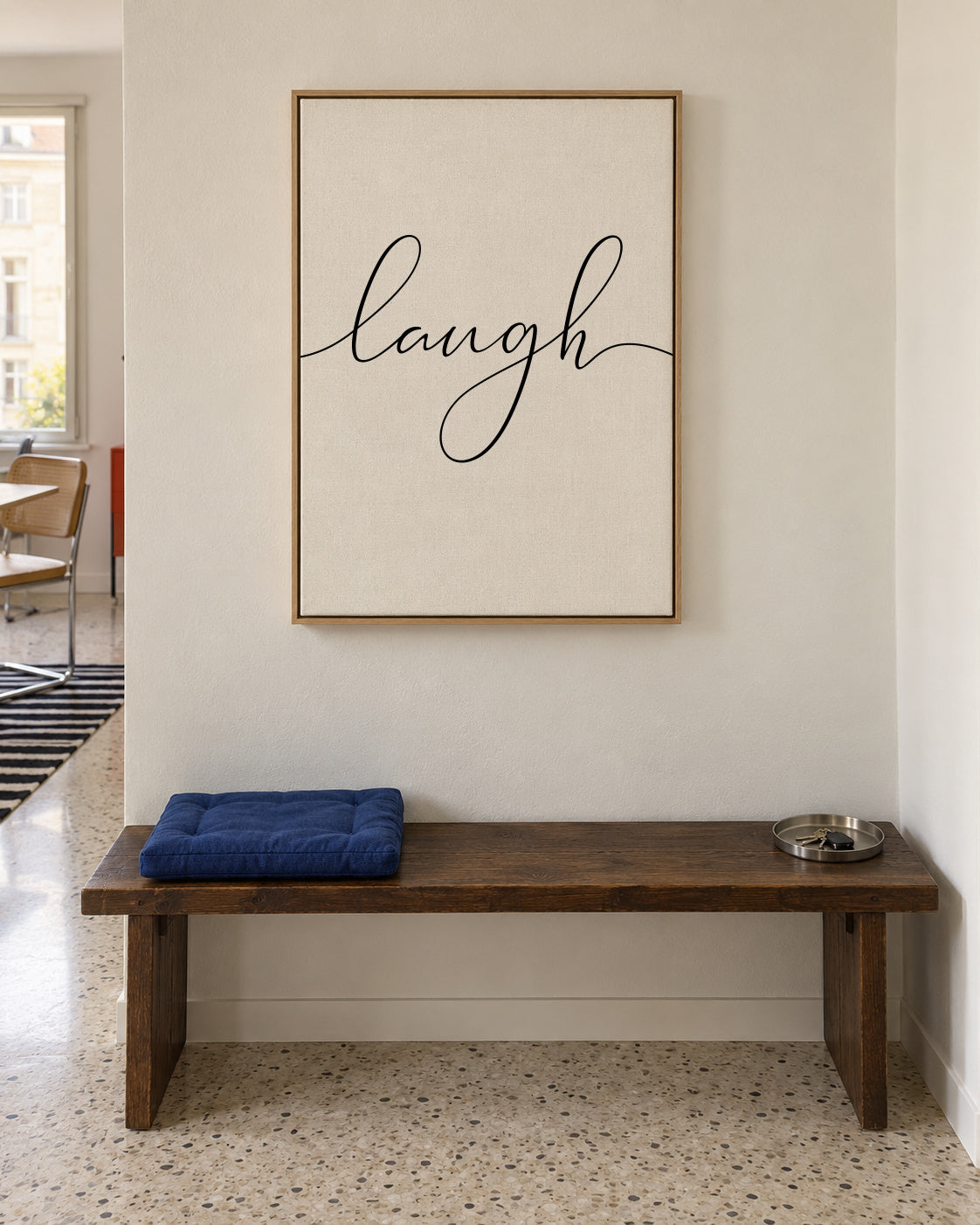 Laugh - Framed canvas in an interior