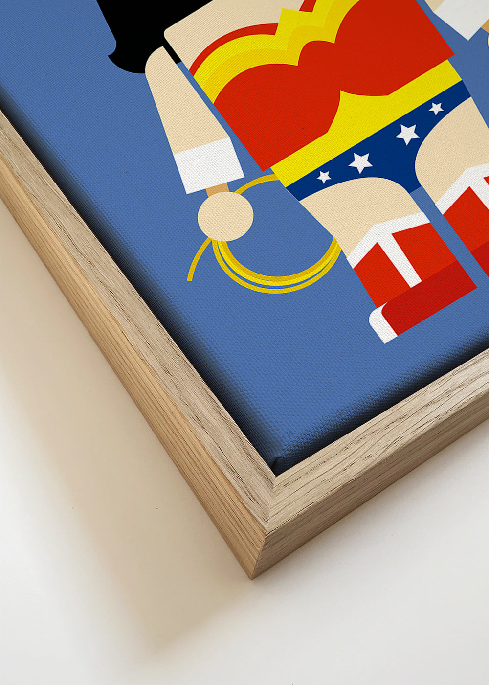 Ilustrace hračka Wonder Woman na modrém pozadí