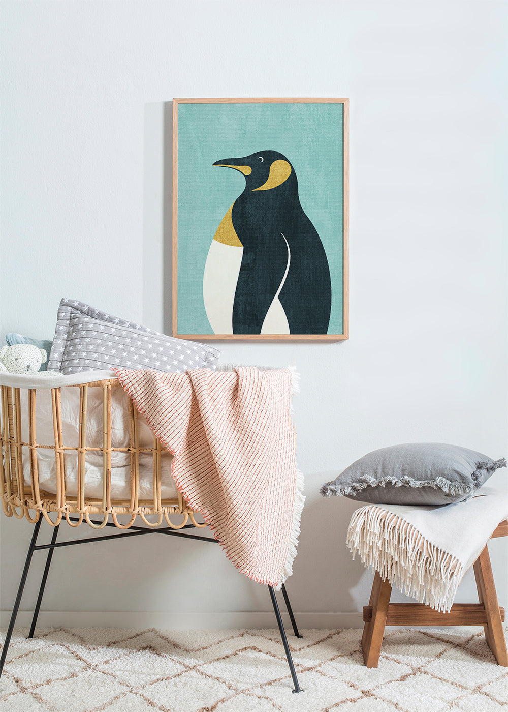 Ilustrace tučňáka na modrém pozadí