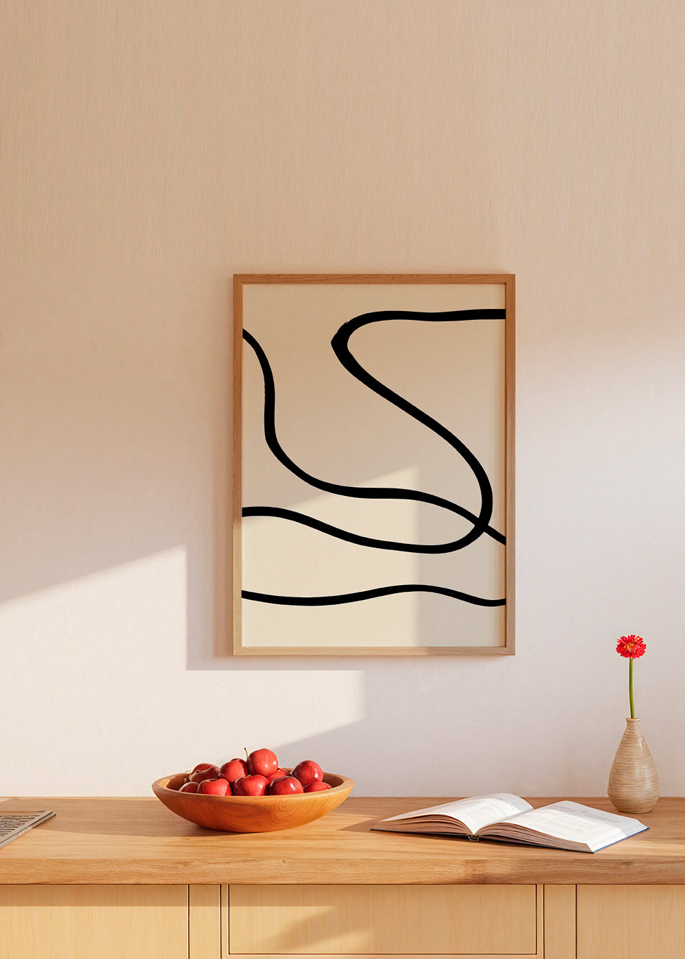 Minimalistický obraz s černými liniemi na béžovém pozadí