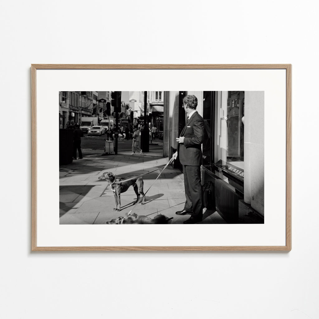 Uliční fotografie muž se psem