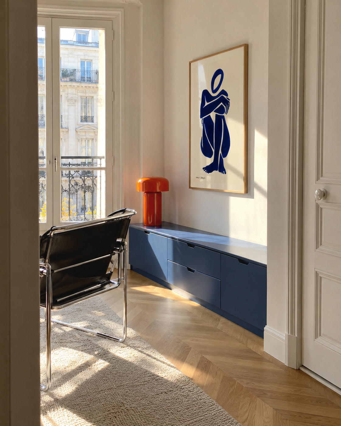 Blue figure #1 - Framed poster in an interior