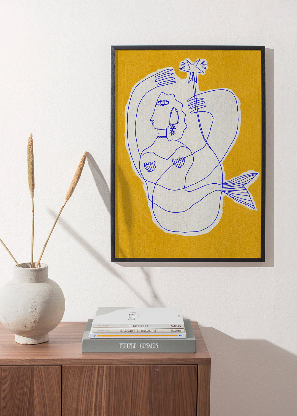 Ilustrace mořské panny modrou linkou na žlutém