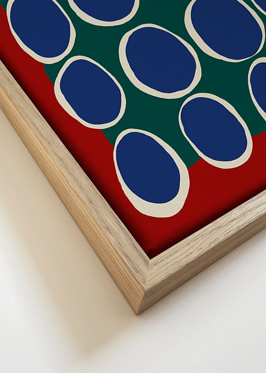 Geometrický obraz s modrými ovály a zeleným polem – Canvas detail