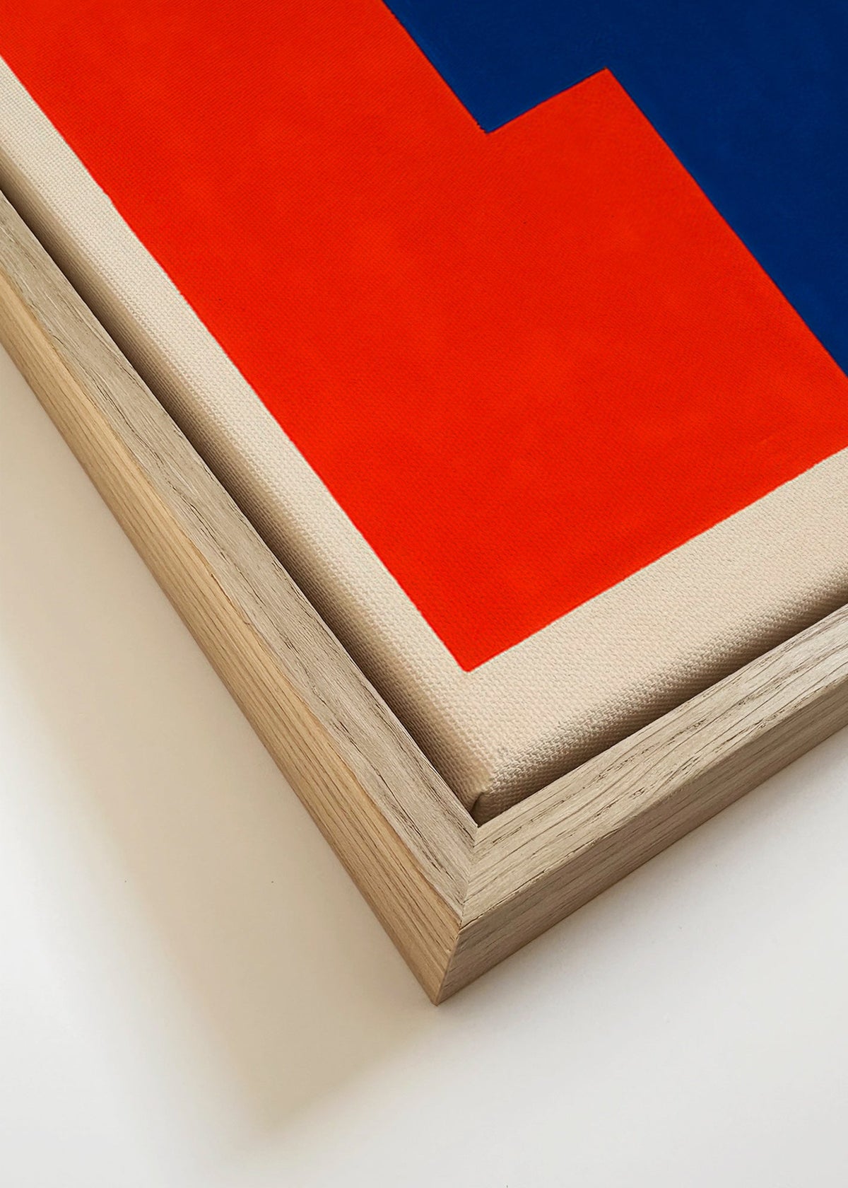 Abstraktní obraz s červenými a modrými bloky – Canvas detail