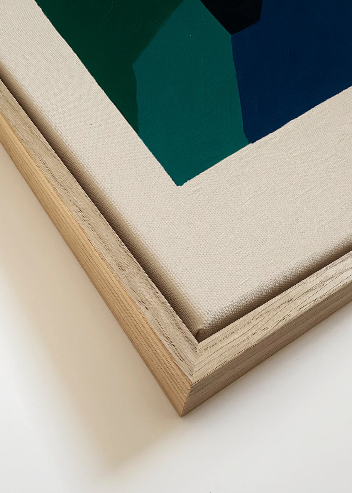 Abstraktní obraz se zelenými a tmavě modrými bloky – Canvas detail