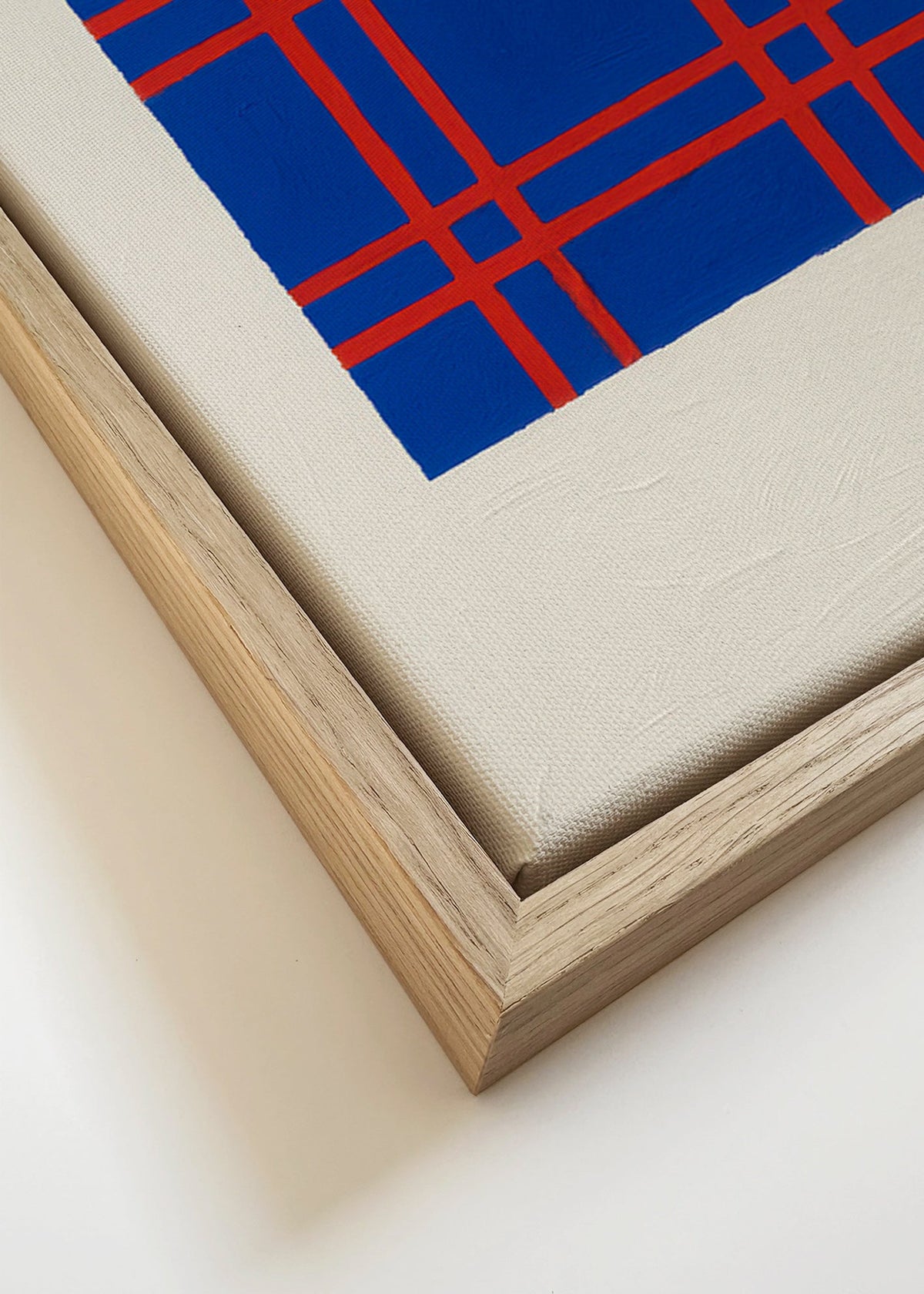 Geometrický obraz modrý s červenou mřížkou – Canvas detail