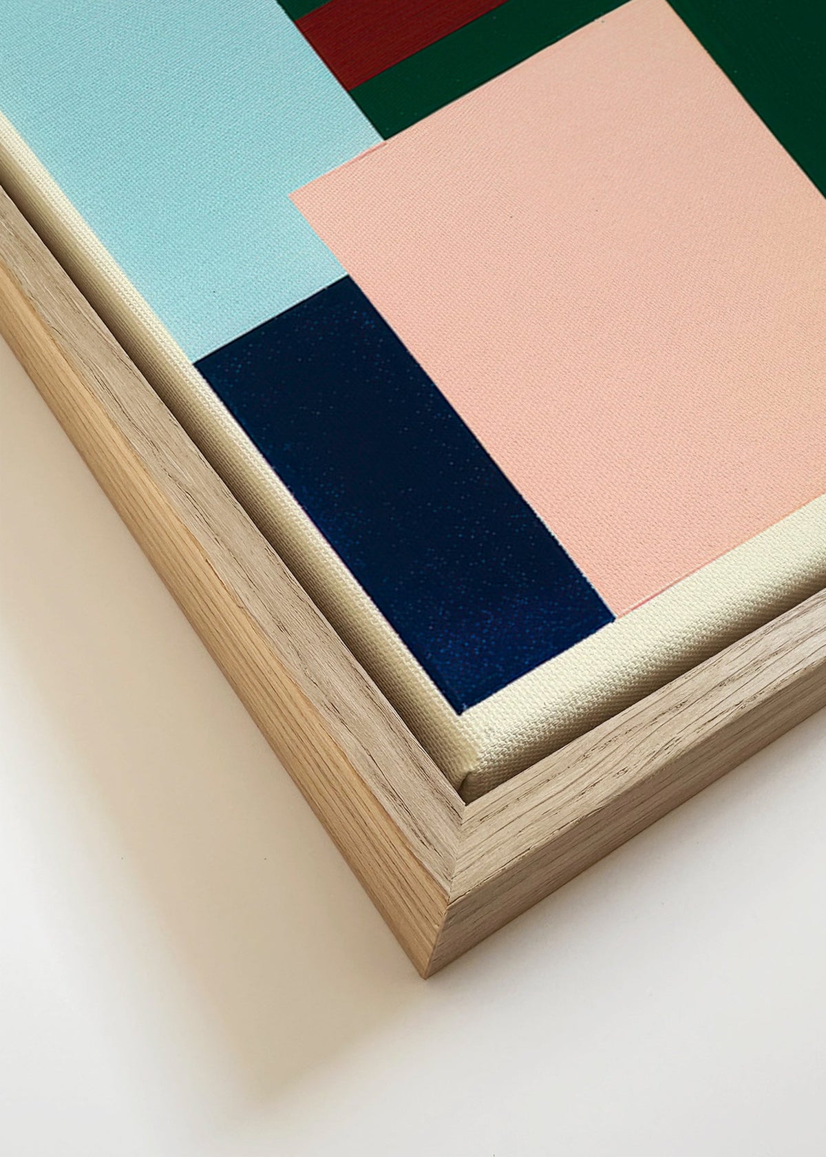Geometrický obraz tmavě zelený a jemně růžový – Canvas detail