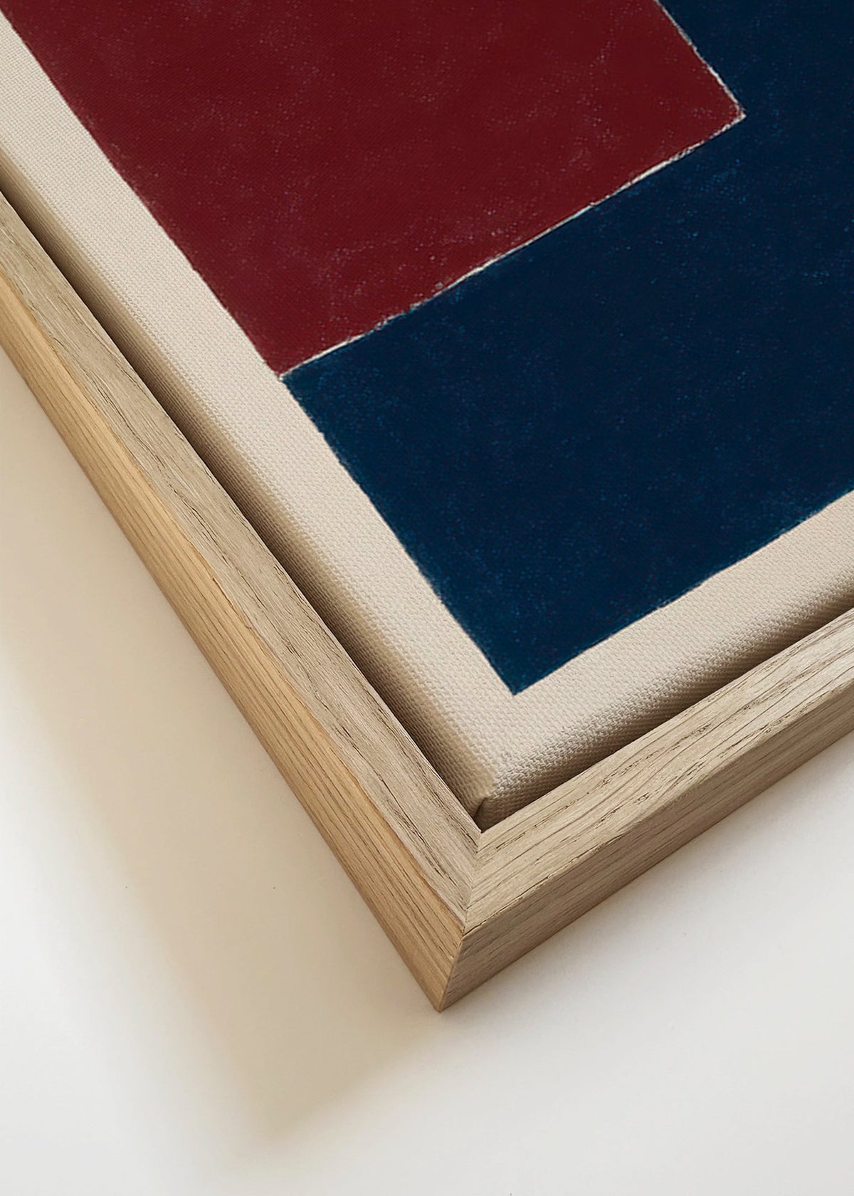 Geometrický obraz s hlubokými modrými a bordovými plochami – Canvas detail