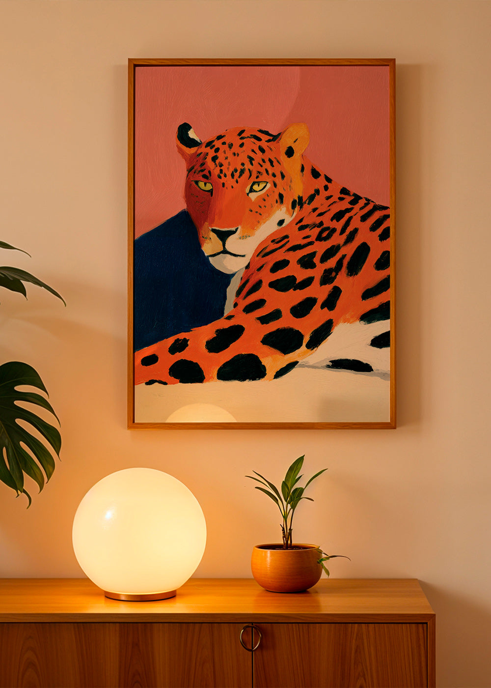 Obraz: Odpočívající leopard na růžovém pozadí