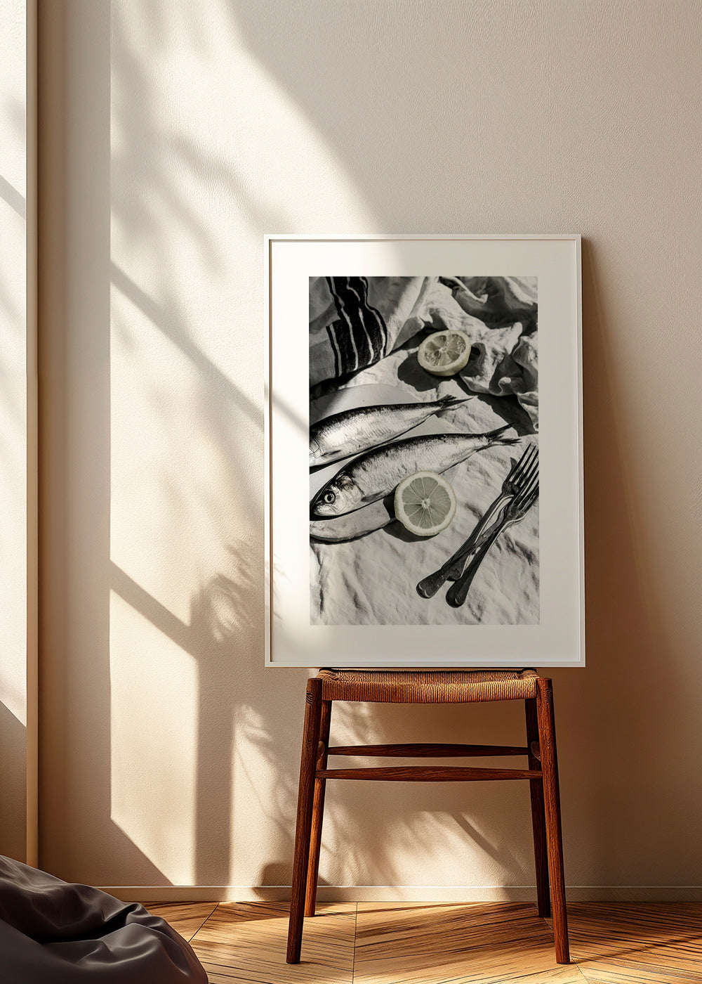 Obraz do kuchyně: sardinky a citron v černobílé
